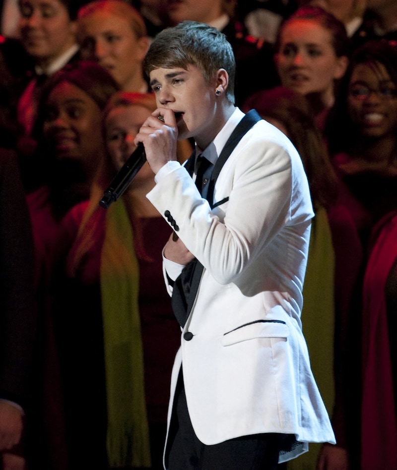 Justin Bieber sang mit 15 Jahren zu Weihnachten für Barack Obama und seine Familie in Washington. (Bild: APA / AFP PHOTO / Saul LOEB SAUL LOEB / AFP)