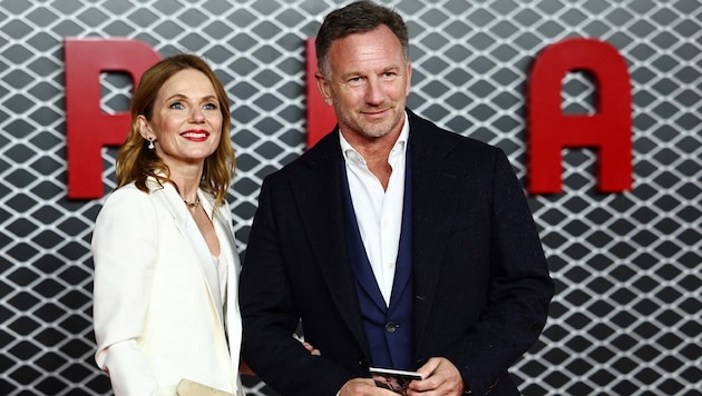 Geri Halliwell mit ihrem Ehemann Christian Horner - hier im Dezember 2023 bei der Premiere des Films „Ferrari“ in London. Heute steht ihre Ehe wohl vor einer Zerreißprobe. (Bild: APA/AFP/HENRY NICHOLLS)