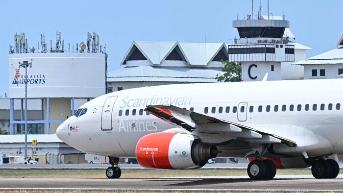 A Boeing 737-700 of Scandinavian Airlines (SAS) carrying the Norwegian King Harald V. at ...