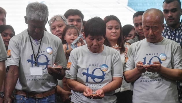 Environ 500 proches et leurs soutiens se sont rassemblés dimanche dans un centre commercial près de la capitale malaisienne Kuala Lumpur pour une journée de commémoration. (Bild: AFP)