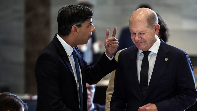 Olaf Scholz muss seinem Amtskollegen Rishi Sunak wohl einige Fragen beantworten. (Bild: AFP)