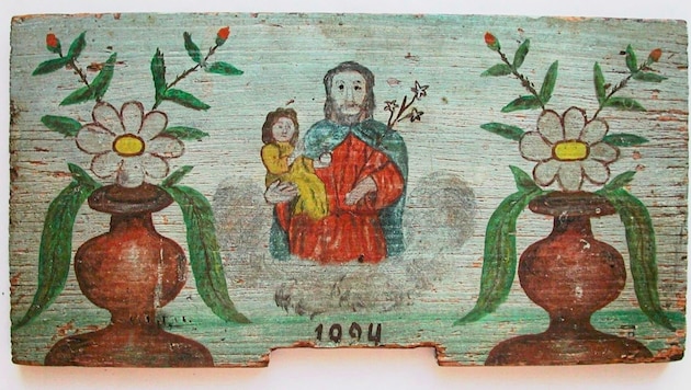 St. Joseph with baby Jesus and lily on a bee board: The foster father of Jesus and patron saint of Carinthia also showed bees the way to the honeycombs. (Bild: Landesmuseum für Kärnten Abteilung Volkskunde)