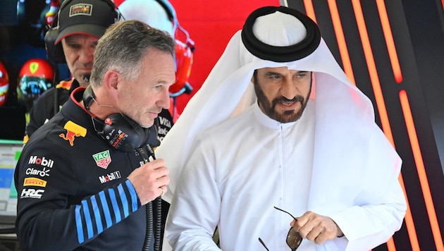FIA-Boss Mohammed bin Sulayem (re.) im Gespräch mit Red-Bull-Teamchef Christian Horner (Bild: APA/AFP/ANDREJ ISAKOVIC)