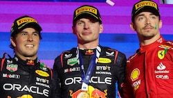 Sergio Perez, Max Verstappen und Charles Leclerc (von li. nach re.) (Bild: APA/AFP/Giuseppe CACACE)