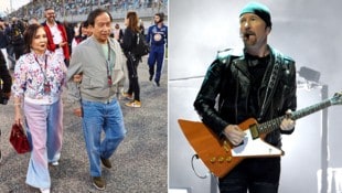 Ob sich Chalerm Yoovidhya (l.) auch über einen U2-Song richtig freuen würde? U2-Gitarrist David Evans, besser bekannt als „The Edge“, hätte schon mal eine Idee für einen pikanten Titel ... (Bild: ASSOCIATED PRESS, APA/AFP/GETTY IMAGES/KEVIN WINTER)