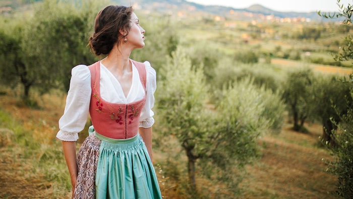 The color scheme of her new dirndl collection is reminiscent of faded, antique frescoes.