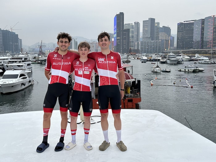 Wafler, Kokas and Schmidbauer on their floating accommodation.