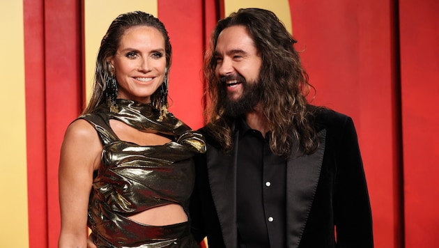 Heidi Klum con su marido Tom Kaulitz en la fiesta de los Oscar de "Vanity Fair (Bild: Danny Moloshok / REUTERS / picturedesk.com)