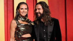 Heidi Klum mit ihrem Mann Tom Kaulitz auf der „Vanity Fair“-Oscar-Party   (Bild: Danny Moloshok / REUTERS / picturedesk.com)