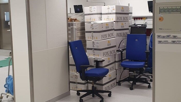 Where patients used to be helped, there is now a pile of goods to be moved.