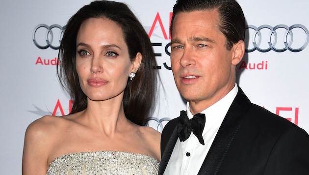 Angelina Jolie ve Brad Pitt güllerin savaşında nihayet bir anlaşmaya varabilir. (Bild: APA/AFP PHOTO / MARK RALSTON )
