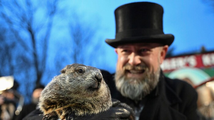 A.J. Dereume from the "Groundhog Club" with the rodent