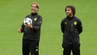 Jurgen Klopp (links) und Patrick Owomoyela  (Bild: AFP / CHRISTOF STACHE)