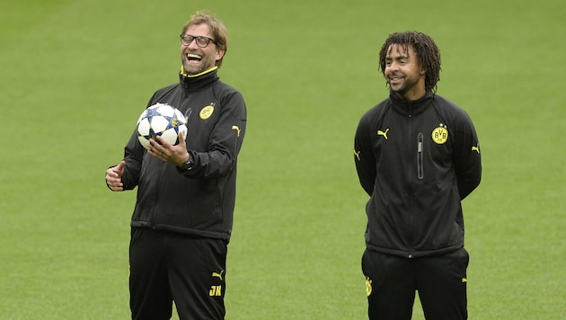 Jurgen Klopp (left) and Patrick Owomoyela