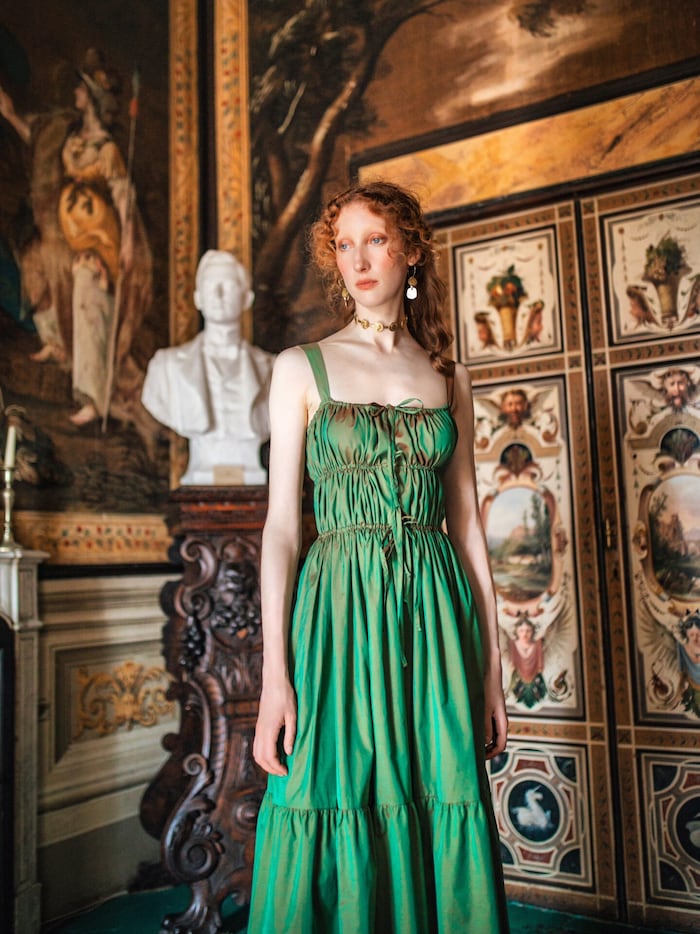 Lush green is reminiscent of the cypress avenues of Tuscany.