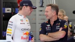 Max Verstappen (l.) und Christian Horner (Bild: APA/AFP/POOL/Giuseppe CACACE)