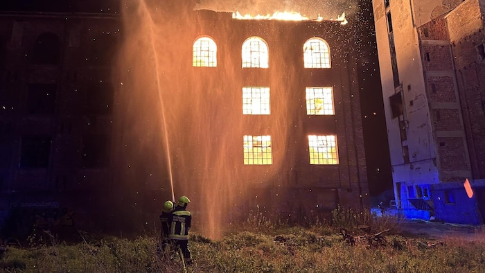 The building was fully engulfed in flames.