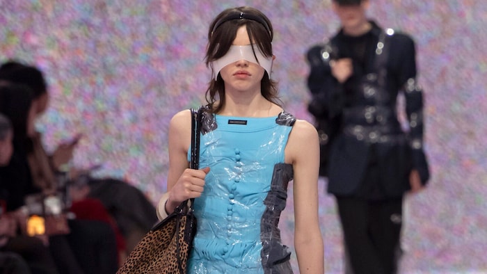 A model presented the "Gaffer Bangle" on the catwalk at the Balenciaga fall/winter show.