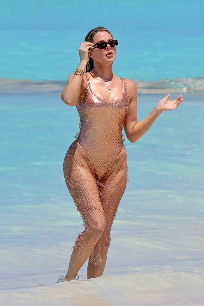 Khloé Kardashian also showed off her curves in a bronze mermaid look.
