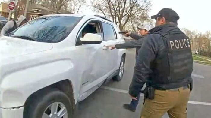 US officials with guns