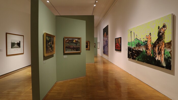 Exhibition view with Herbert Brandl's "Orange Hyenas" (2017, pictured far right)