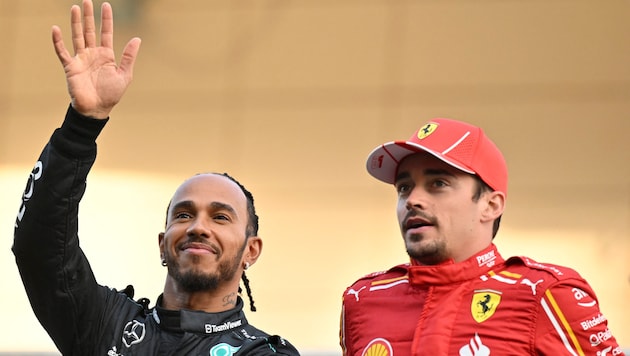 Lewis Hamilton und Charles Leclerc (rechts) sind bald Teamkollegen. (Bild: APA/AFP/ANDREJ ISAKOVIC)