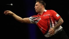 Gerwyn Price sorgte mit seinem vorzeiten Abgang für Kopfschütteln.  (Bild: APA/AFP/Adrian DENNIS)