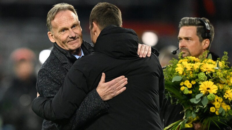 Hans-Joachim Watzke (l.) fand lobende Worte über Marcel Sabitzer. (Bild: APA/AFP/INA FASSBENDER)