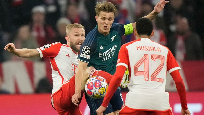 Martin Ödegaard (center) (Bild: AP)