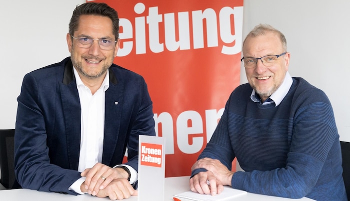 Alois Rainer, Chairman of the Tourism Division of the Tyrolean Chamber of Commerce (left), in ...