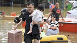 Im Süden Chinas wurden jetzt mehr als 110.000 Menschen aufgrund von Hochwasser evakuiert. (Bild: AFP)