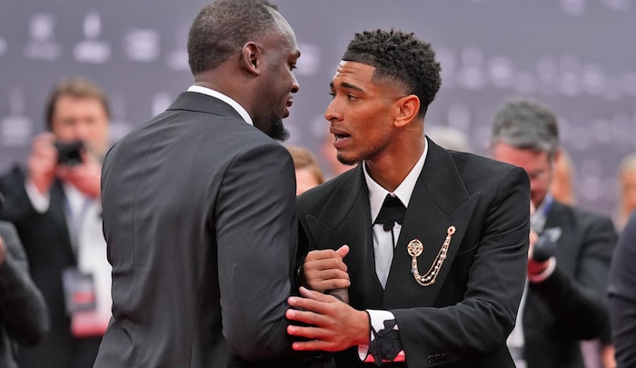Bellignham (re.) bei der Laureus-Gala in Madrid mit Sprint-Gott Usain Bolt 