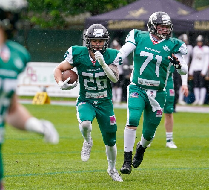 Jonas (right) is part of the O-line as a center.
