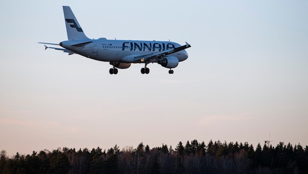 A Finnair passenger jet (Bild: APA/AFP/Jonathan NACKSTRAND)