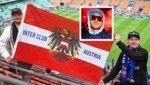 „Inter Club Austria-Boss Lukas Ammann (li.) mit der Fahne und Fanclub-Mitglied Michael im Meazza-Stadion. (Bild: Krone KREATIV/www.inter-club.at)