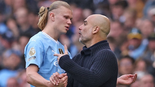 Erling Haaland with coach Pep Guardiola - there's no problem between them (unless Haaland is substituted). Haaland doesn't have it so good with another honorable gentleman from world soccer ... (Bild: AFP/APA/Darren Staples)