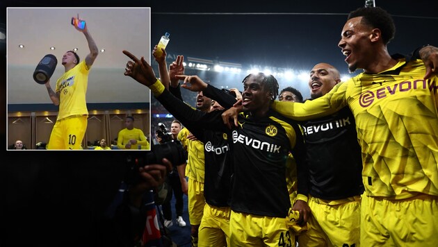 Party mood among the Dortmund players (Bild: AFP/APA/Anne-Christine POUJOULAT)