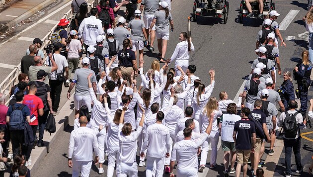 The torch relay has begun (Bild: ASSOCIATED PRESS)