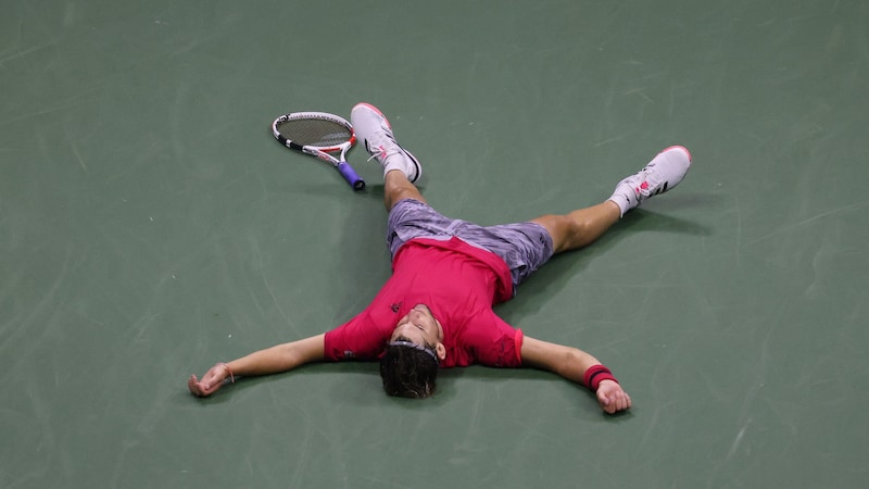 A picture for eternity: Thiem after his US Open title (Bild: APA Pool/APA/Getty Images via AFP/GETTY IMAGES/AL BELLO)