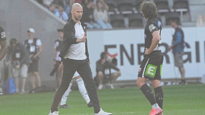 Coach Ilzer built up his men after the final whistle.