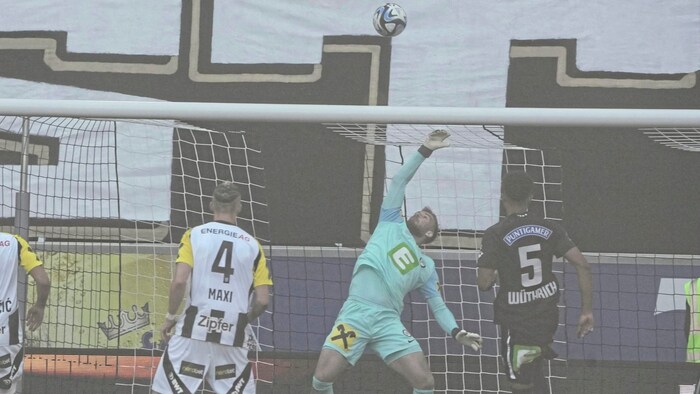 Jaros makes a save.