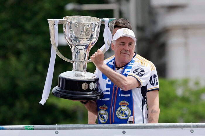 Carlo Ancelotti with the trophy.