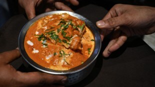 Butter Chicken zählt zu den weltweit beliebtesten Gerichten aus Indien, doch wer hat es erfunden? (Bild: Arun SANKAR)