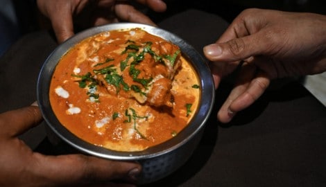 Butter Chicken zählt zu den weltweit beliebtesten Gerichten aus Indien, doch wer hat es erfunden? (Bild: Arun SANKAR)