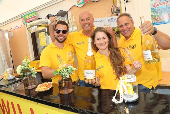 Hard at work behind the champagne bar: Daniel, Martin, Maria and Tom