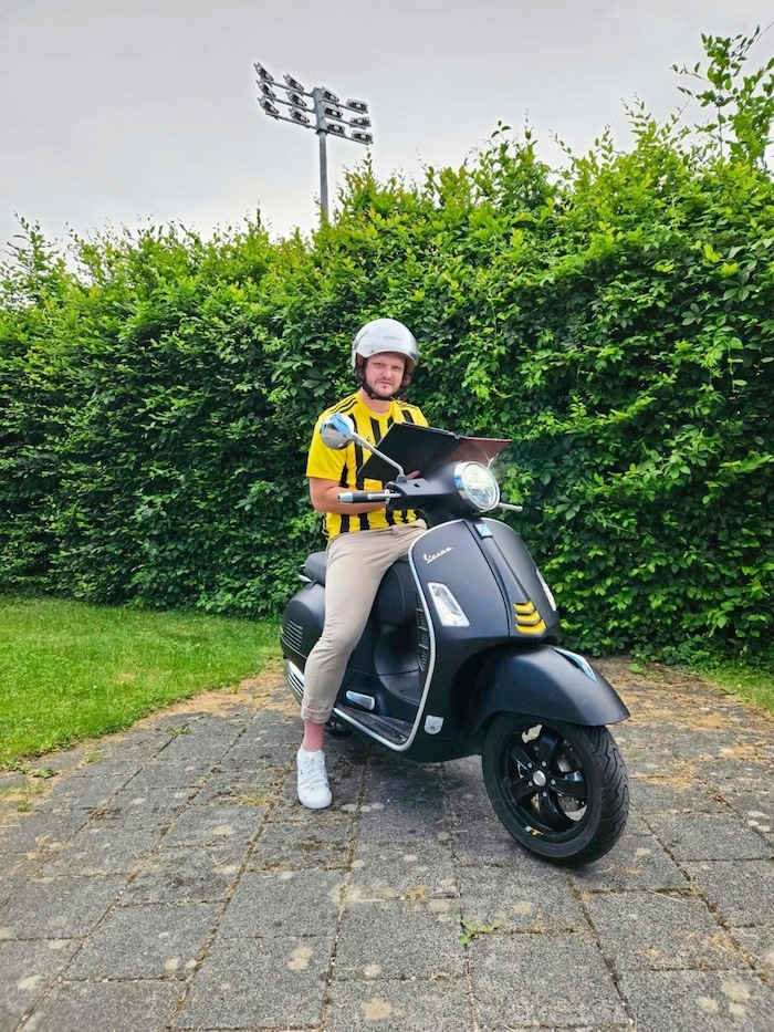 He finds time to take a deep breath and think on his Vespa.