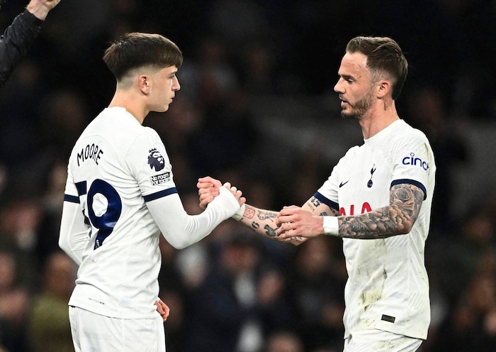 Moore (left) already got a taste of the Premier League at Tottenham.