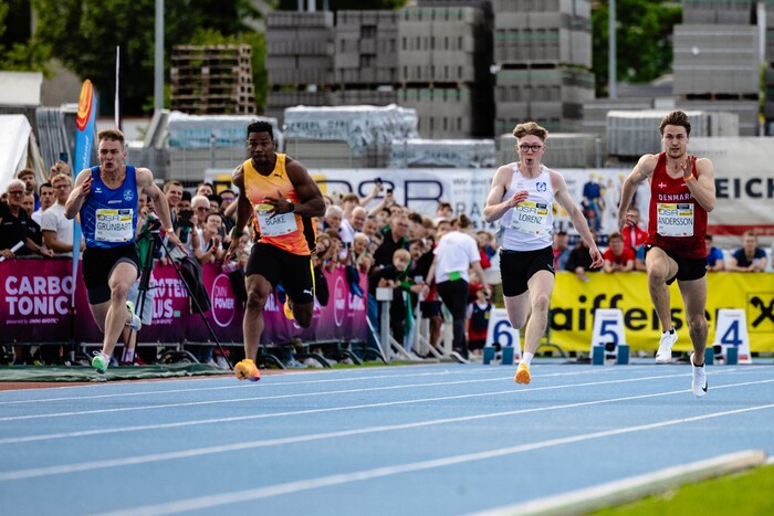 Jonas Lorenz from Jabingen (in white) ran against superstar Blake in the preliminary heat.