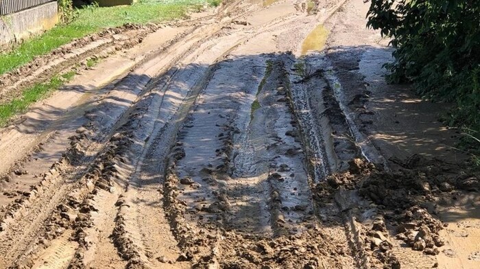 Thick layers of mud remained after the storm.