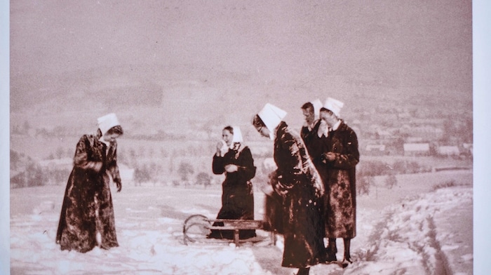 Deaconess sisters in their habit in the snow around 1960 